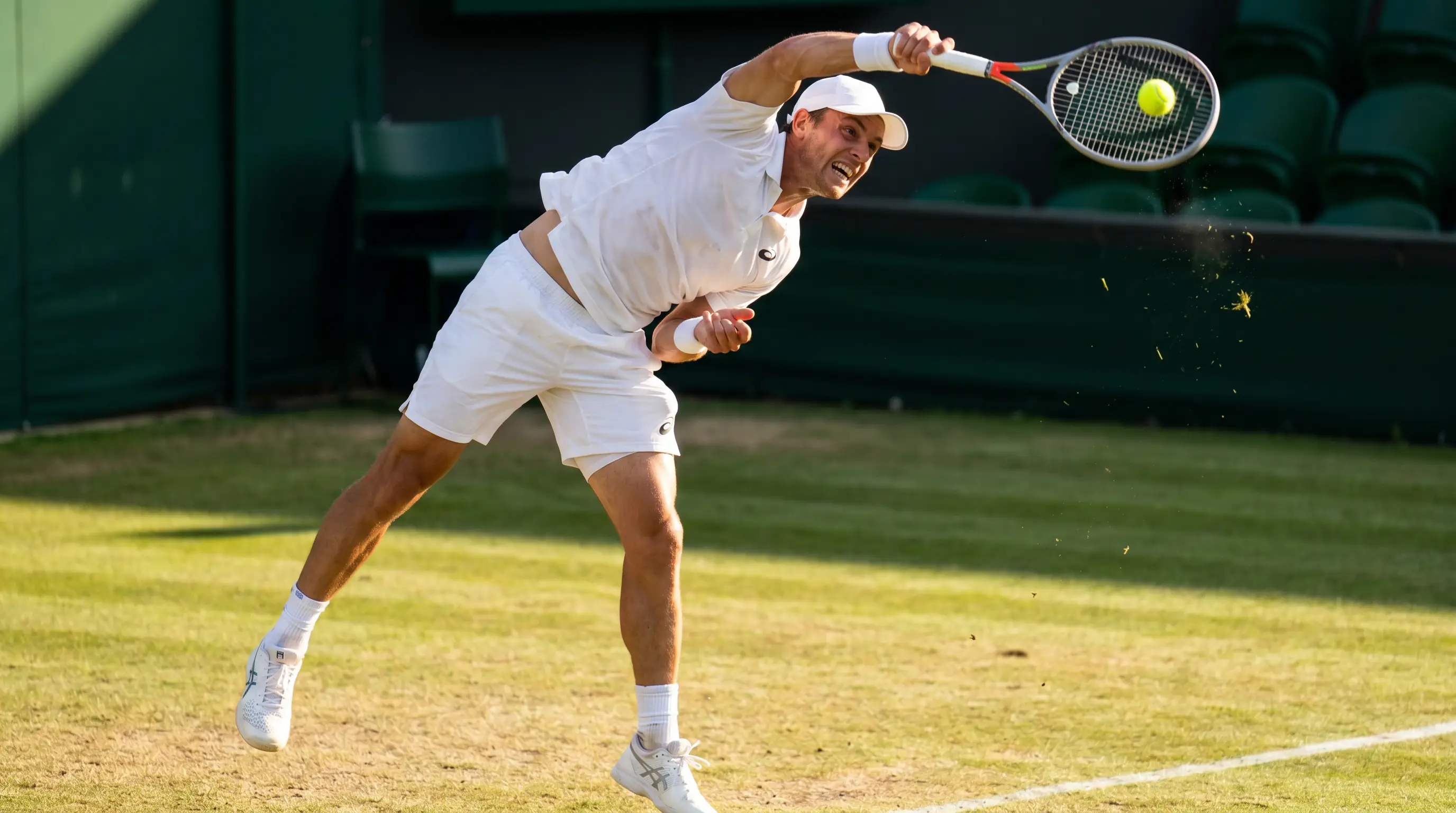 Player hitting a powerful first serve on the Wimbledon grass court