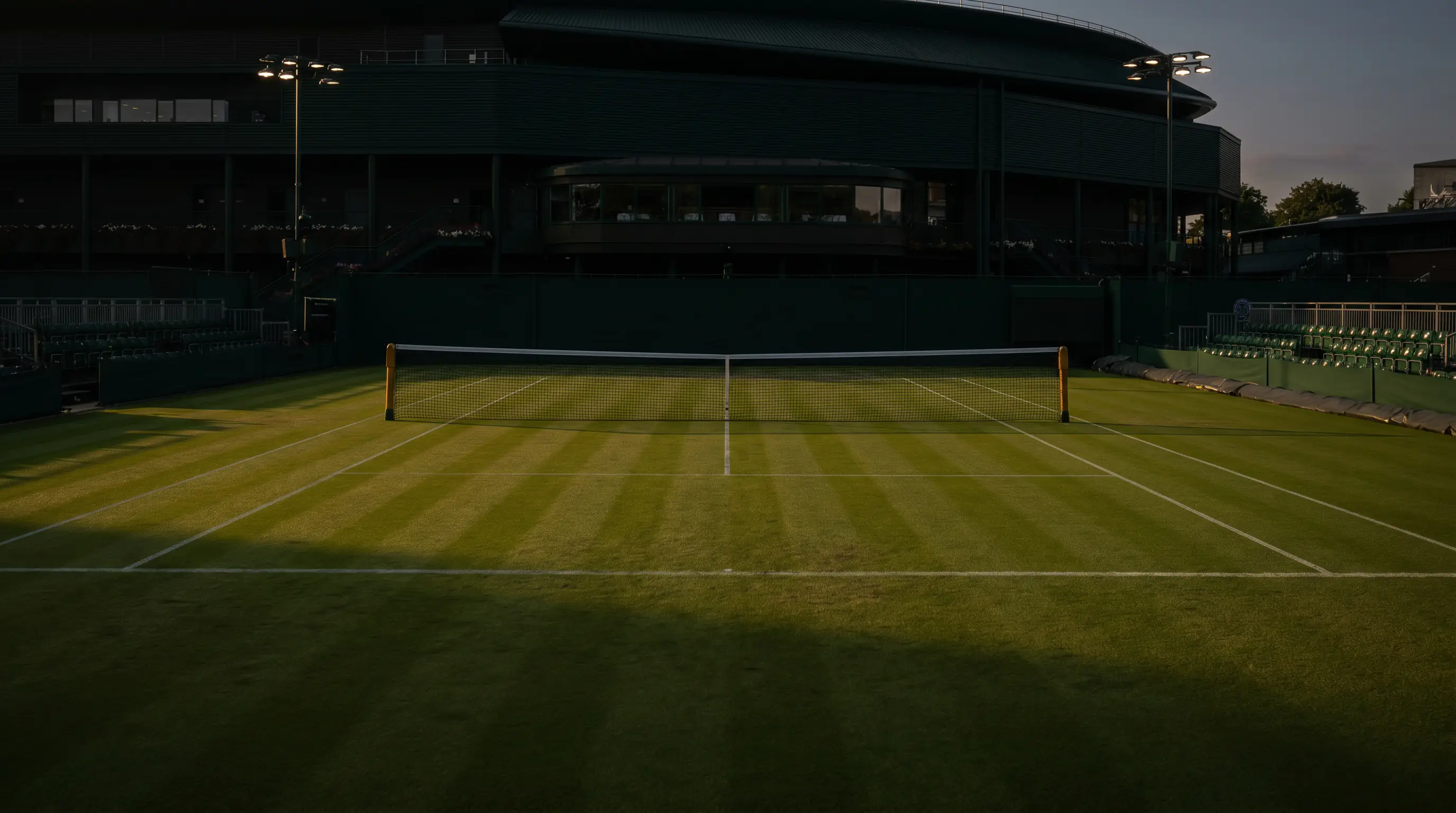 A seeded player serving on a Wimbledon grass court in an early-round singles match